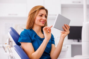 Dental professional working in a modern clinic